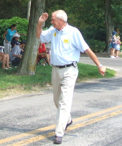 Sheriff candidate Kirk Daugherty walks the parade route.